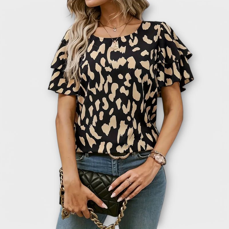 Lela – Stilfuld bluse med leopardærmer